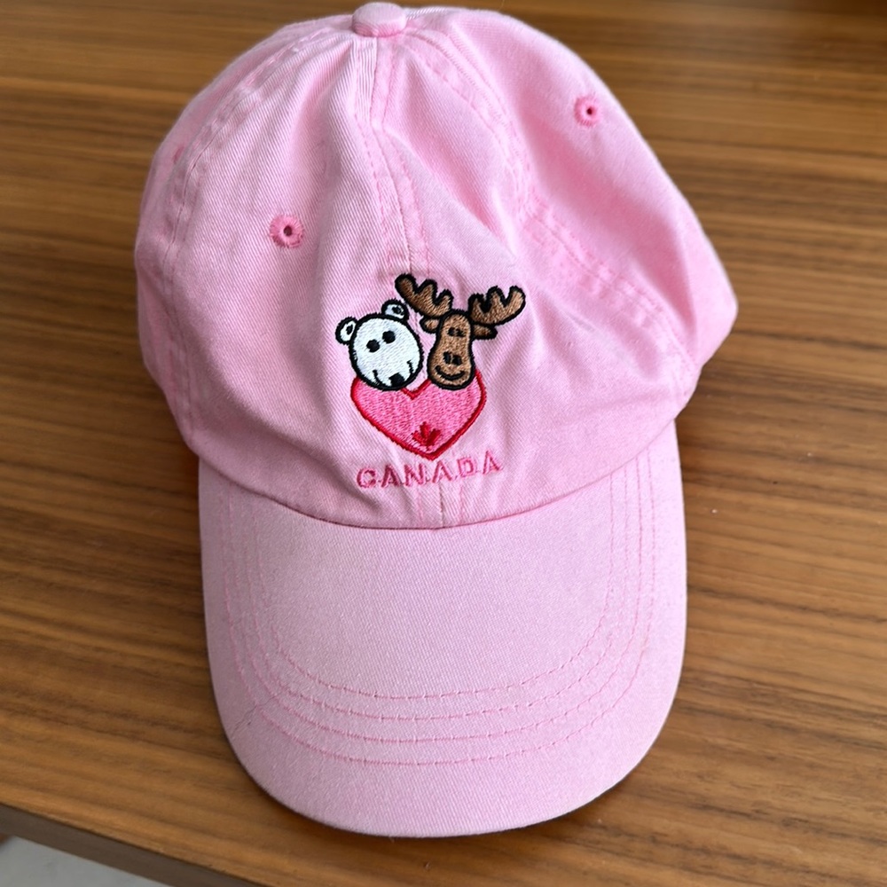 Kids hat with Velcro adjustable strap.